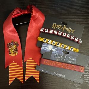 2 Gryffindor Bracelets (one is rubber and one is cord). 1 Gryffindor Hair Tie.